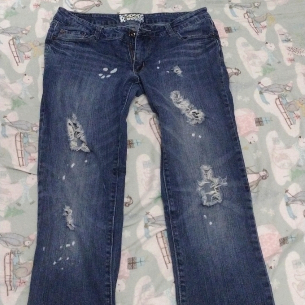 Blue low waist, skinny jeans, with holes and fashionable bleach spots